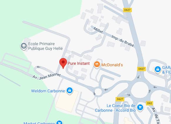 Carte de Carbonne : localisation de Pure Instant, École Primaire Guy Hellé, McDonald's, Weldon et ronds-points D627.